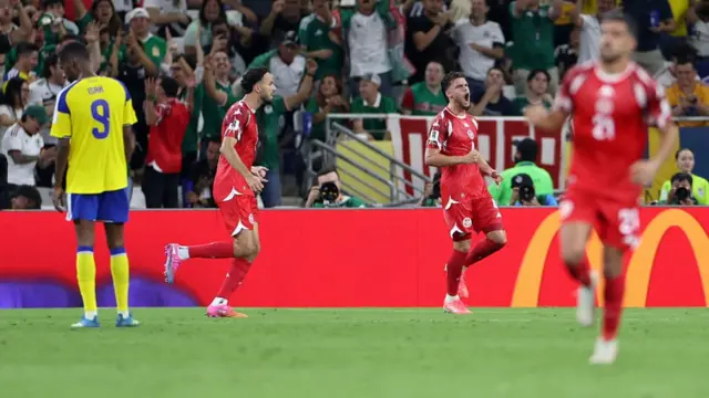 Omar Rekik celebrates scoring his team's second goal