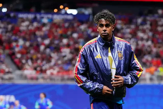 Lamine Yamal of Spain looks on