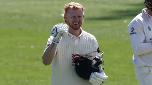Jordan Cox celebrates his double century for Essex