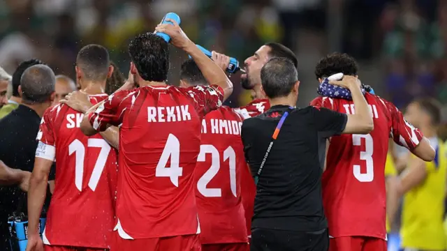 Tunisia's players take part in the hydratation break