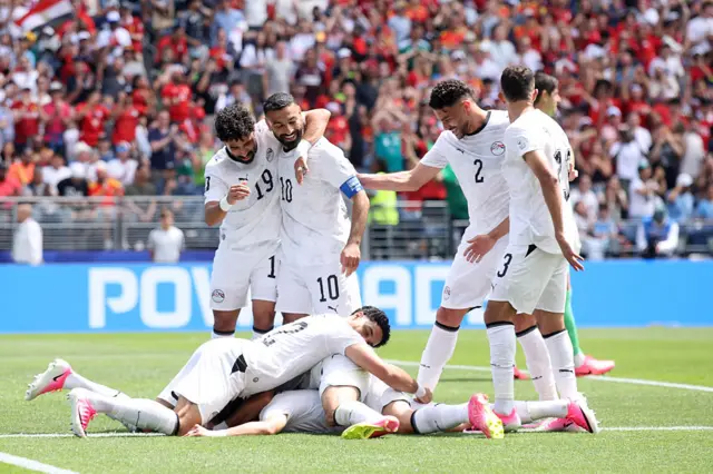 Emam Ashour celebrates with teammates