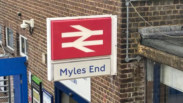 The Sign at Luton railway station, which reads "Myles End"