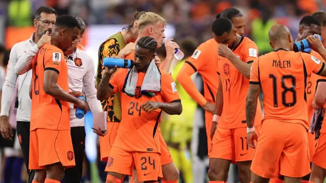 Netherlands players take a hydration break in their game against Japan in Dallas