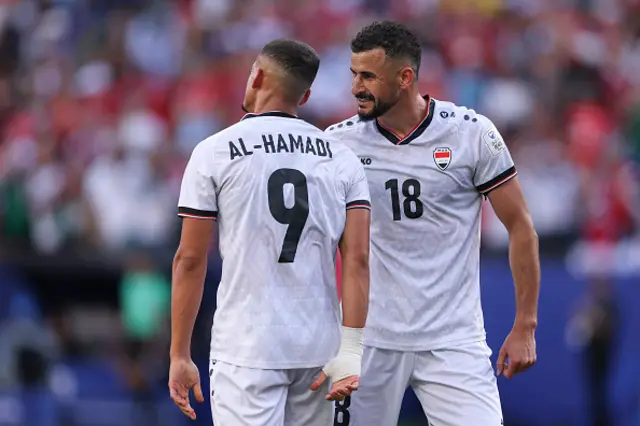 Ali Alhamadi and Aymen Hussein of Iraq react