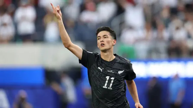 Elijah Just celebrates scoring