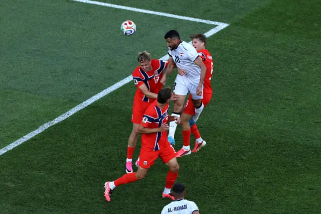 Aymen Hussein of Iraq scores his team's first goal