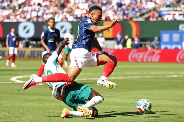 Sadio Mane and France's forward #10 Kylian Mbappe fight for the ball