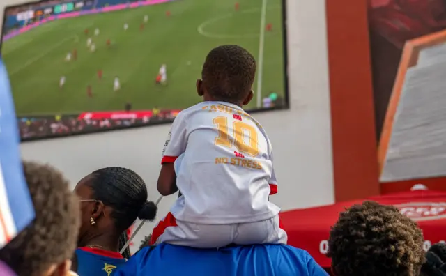 Children watching football in Cape Verde