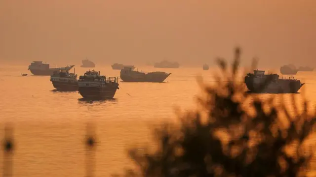 Vessels at the Strait of Hormuz, as seen from Musandam, Oman, June 16, 2026.