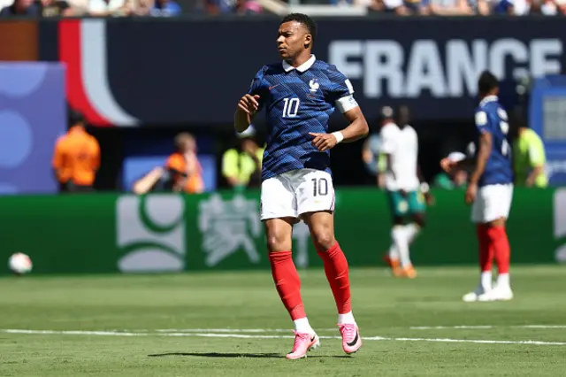 Kylian Mbappe reacts