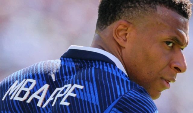 France's Kylian Mbappe looks on