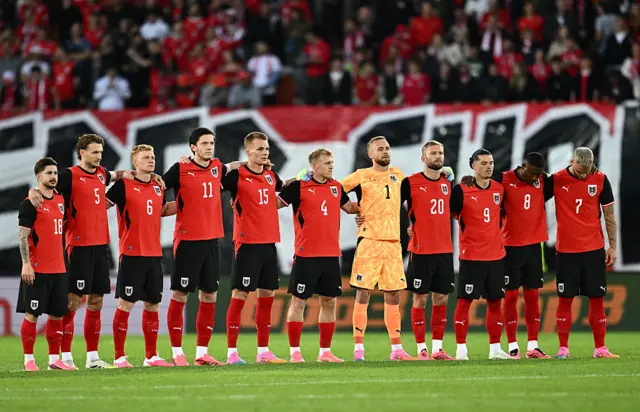 Austrian players line up to sing anthem