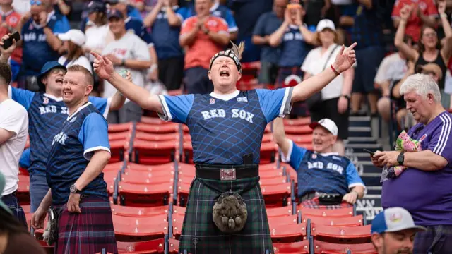 Members of the Tartan Army, Team Scotland World Cup supporters, are seen in the stands prior to the game between the Texas Rangers and the Boston Red Sox at Fenway Park on Sunday, June 14, 2026 in Boston, Massachusetts