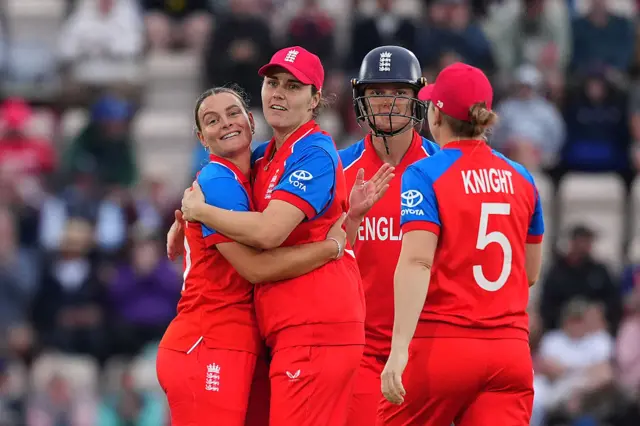 England's Dani Gibson celebrates with the rest of the team
