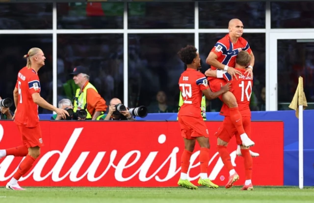 Norway's Leo Ostigard celebrates scoring their third goal