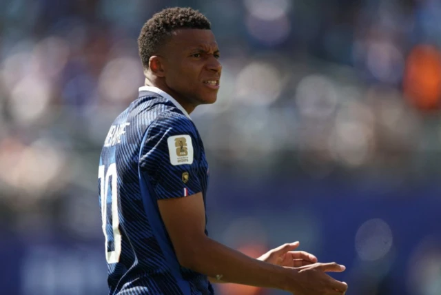 France's Kylian Mbappe reacts