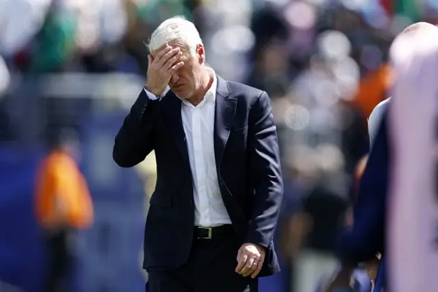 Didier Deschamps looks on