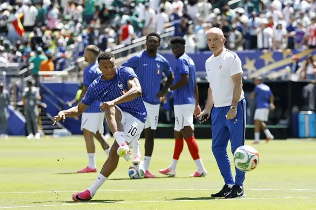 Kylian Mbappe of France warms up