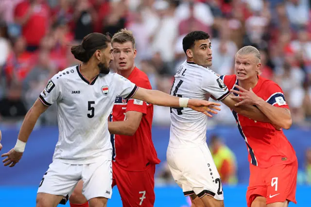 Erling Haaland of Norway is challenged by Zaid Ismael