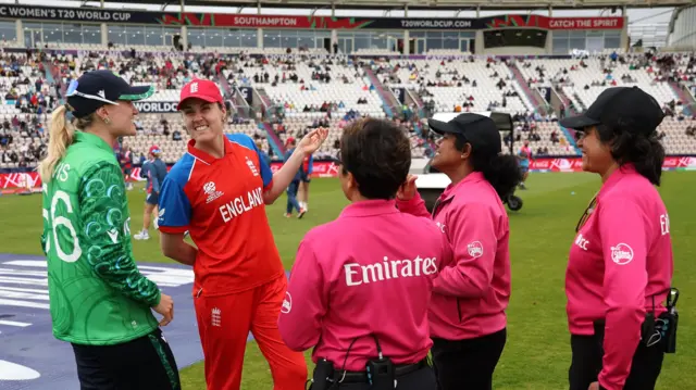 Gaby Lewis and Nat Sciver-Brunt with match officials