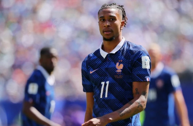 France's Michael Olise looks on
