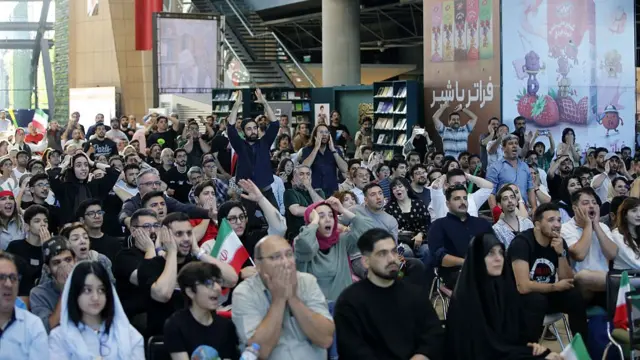 ranian football fans gathered in large venues and cafes, including the popular 'Book Garden', watch their national team's opening match against New Zealand at the 2026 FIFA World Cup in Tehran, Iran, on June 16, 2026. Wearing national jerseys and waving flags, a large number of supporters filled the specially prepared platforms to follow the thrilling encounter with great passion, which eventually ended in a 2-2 draw.