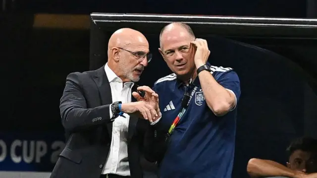 Head coach Luis de la Fuente of Spain talks with an assistant coach during the FIFA World Cup 2026 Group H match between Spain and Cape Verde on June 15th, 2026 at Atlanta Stadium in Atlanta, GA.