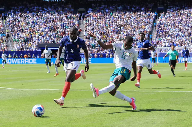 Nicolas Jackson of Senegal shoots as Dayot Upamecano