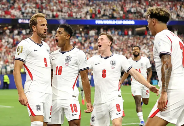 Harry Kane of England celebrates with teammates