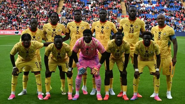 Ghana's goalkeeper #01 Lawrence Ati-Zigi (C) poses with teammates ahead of the international friendly football match between Wales and Ghana ahead of the 2026 FIFA World Cup football tournament, at Cardiff City Stadium, in Cardiff, on June 2, 2026.