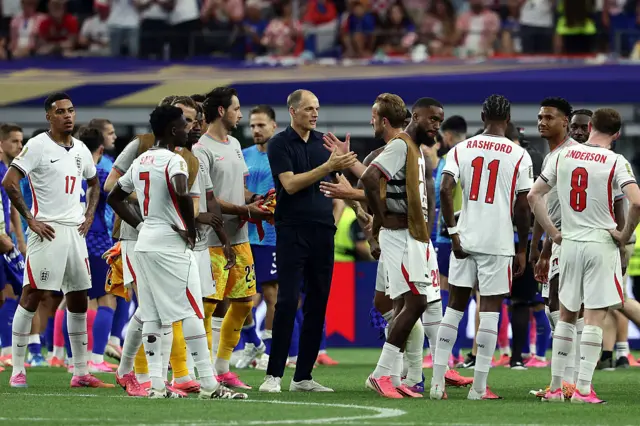 England's German head coach Thomas Tuchel (C,L) celebrates