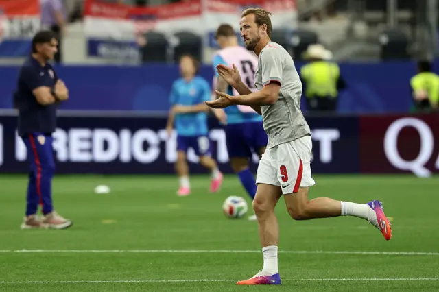 Kane runs out to warm up