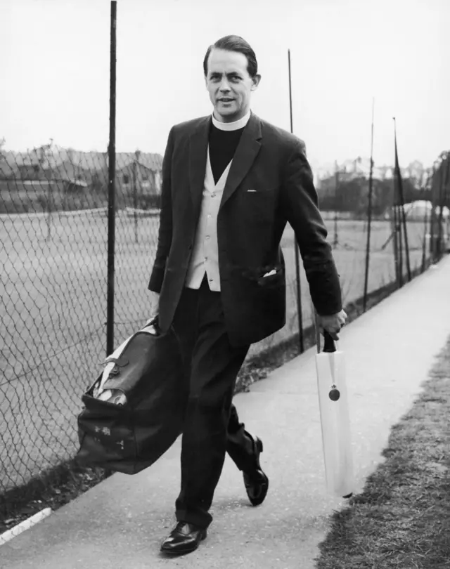 Bishop David Sheppard walking to nets with his dog collar and cricket bat