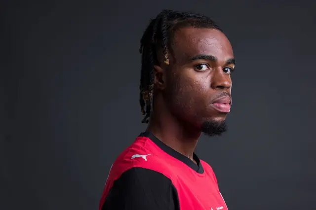 Carney Chukwuemeka looks on