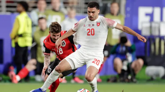 Romano Schmid of Austria, Mohannad Abu Taha of Jordan