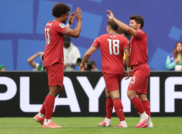 Joao Neves #15 of Portugal celebrates with teammates