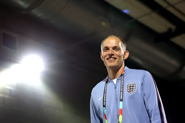 Tuchel smiles as he arrives