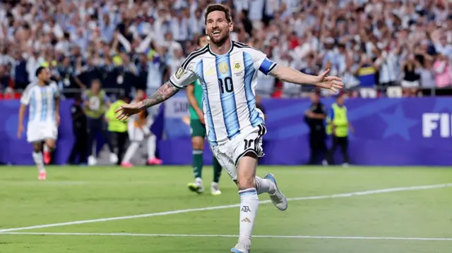 Lionel Messi celebrates scoring