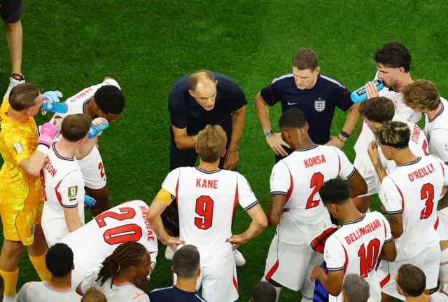 England manager Thomas Tuchel gives instructions to England players