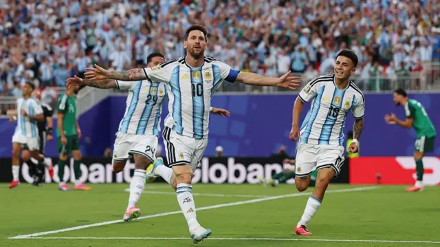 Lionel Messi celebrates scoring