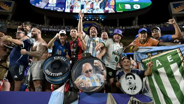 Argentina fans celebrating in the crowd