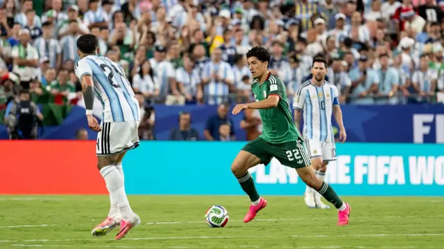 Ibrahim Maza of Algeria controls the ball