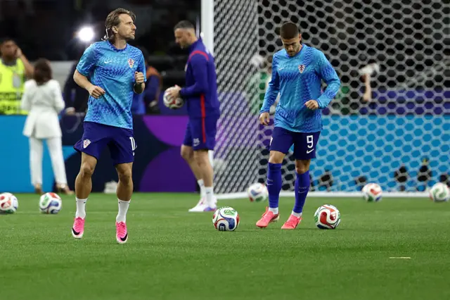 Modric warms up