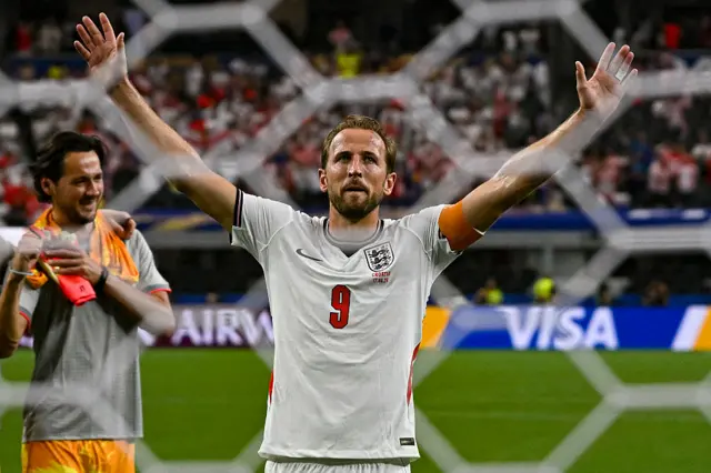 Harry Kane of England thanks supporters for standing