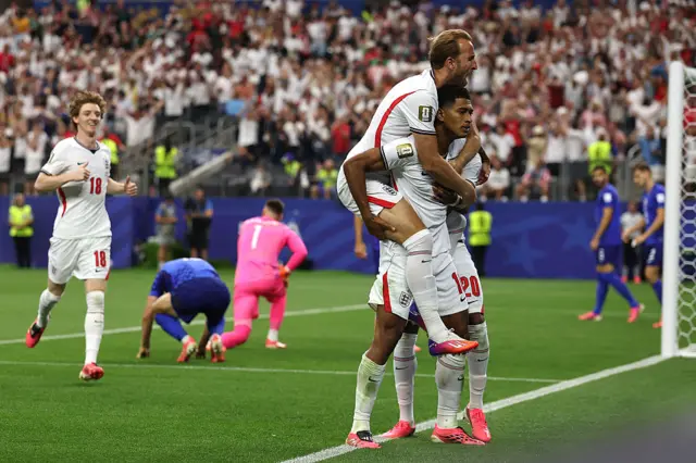 Jude Bellingham #10 of England celebrates with Harry Kane
