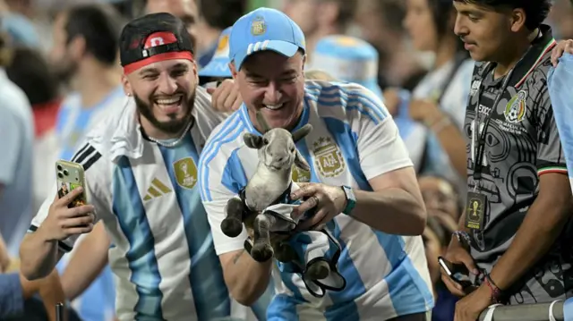 Argentina fans celebrating in the crowd