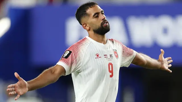Ali Olwan celebrates scoring