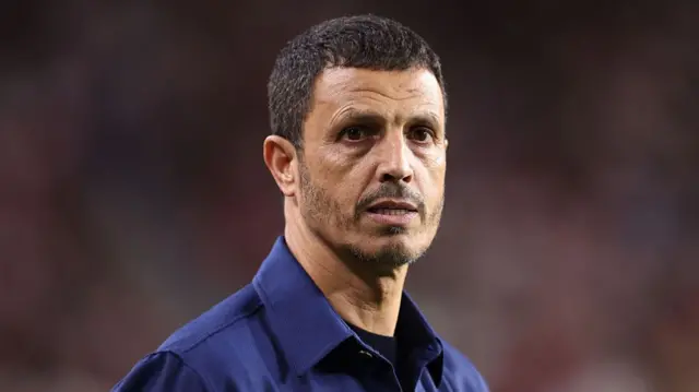Jordan coach Jamal Sellami looks on