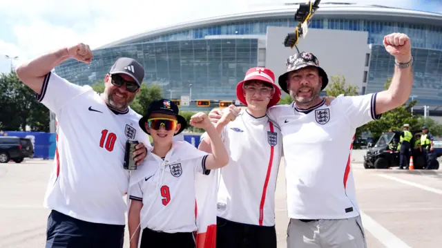 England fans pose outside Dallas stadium