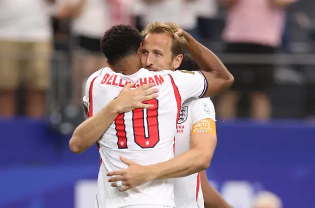 Jude Bellingham of England celebrates after he scores a goal to make it 3-2 with Harry Kane